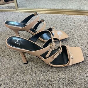 Mark Fisher heels 9 1/2. Runs small. I wear at 8 1/2 fits me.